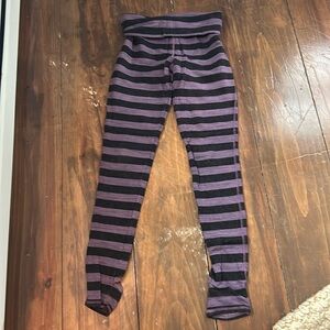 Free people purple and black stirrup leggings. Super thick and warm.